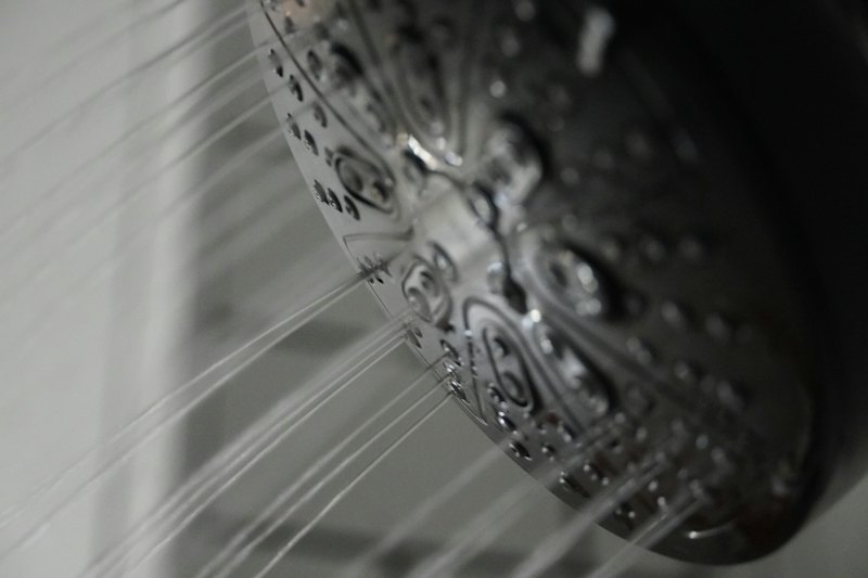Water streaming from a rainfall shower head